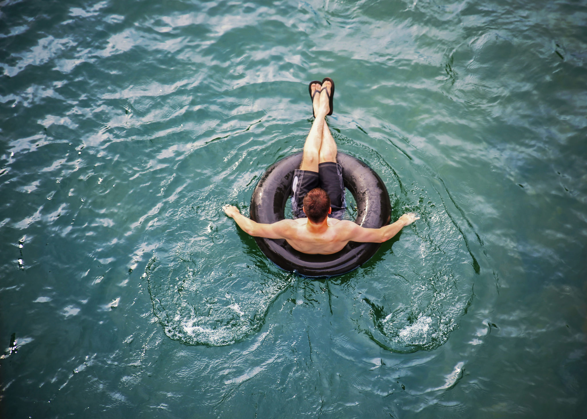 Man floating in a river