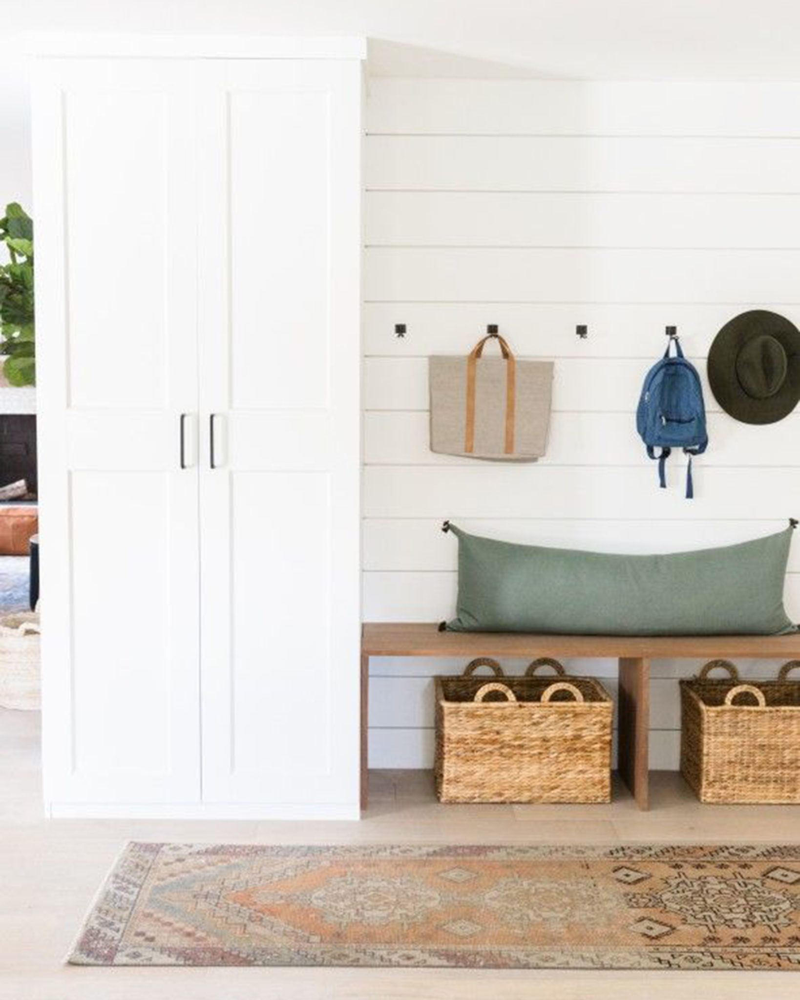 Mudroom with shiplap walls