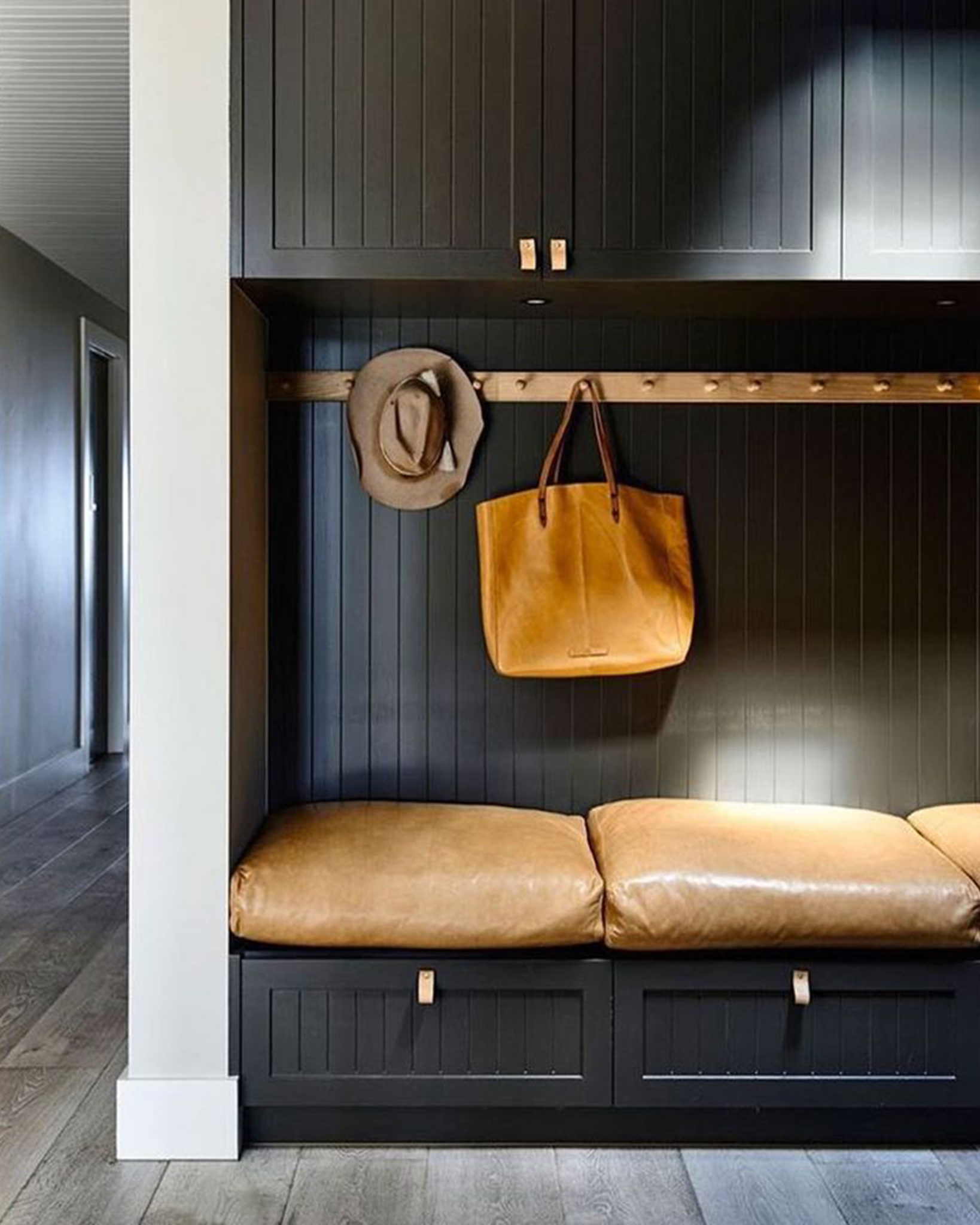 Moody mudroom with leather seats