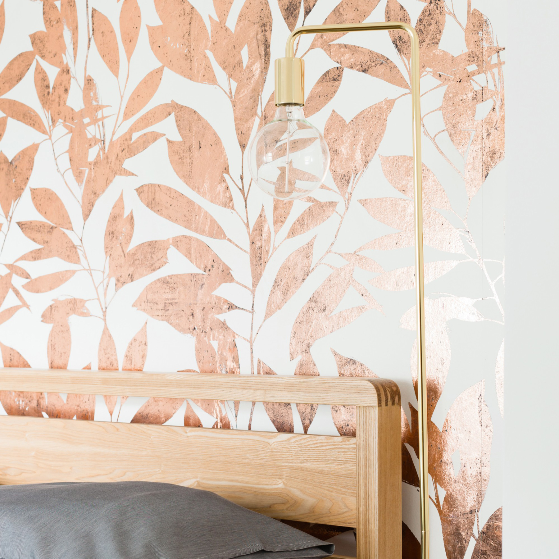 Gold leaf wall paper in a bedroom