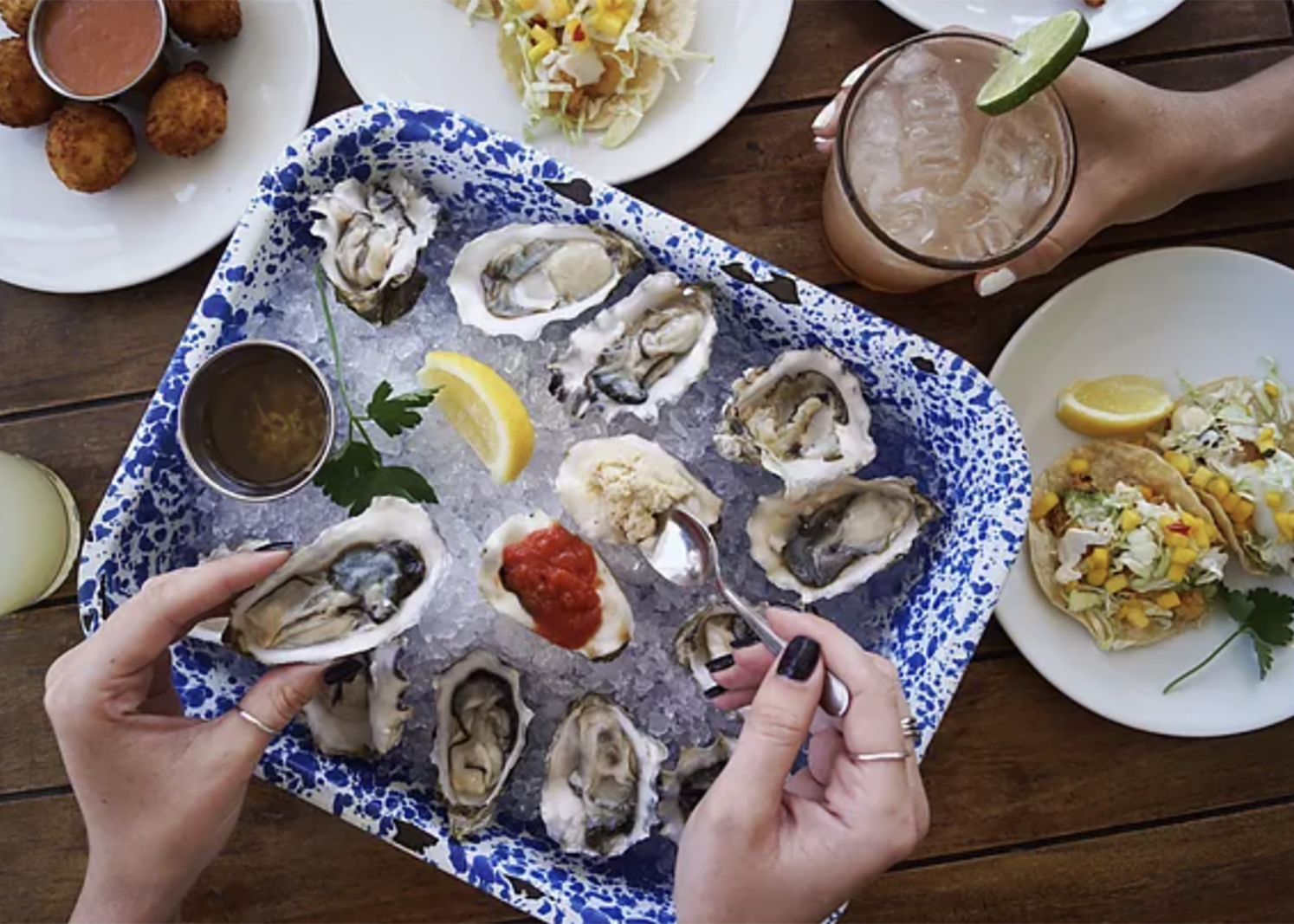 A dining table with oysters