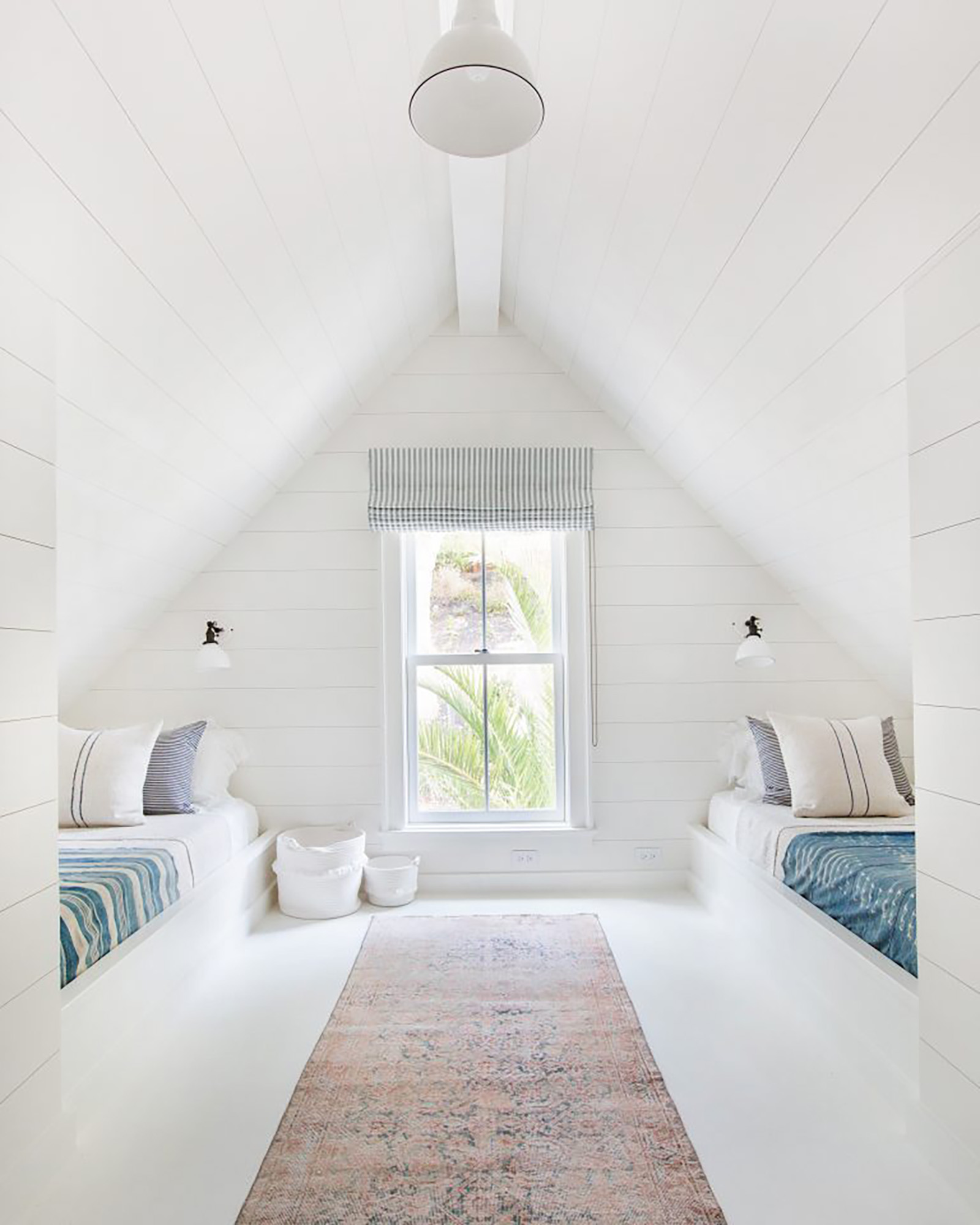 Childrens bedroom with vaulted ceilings