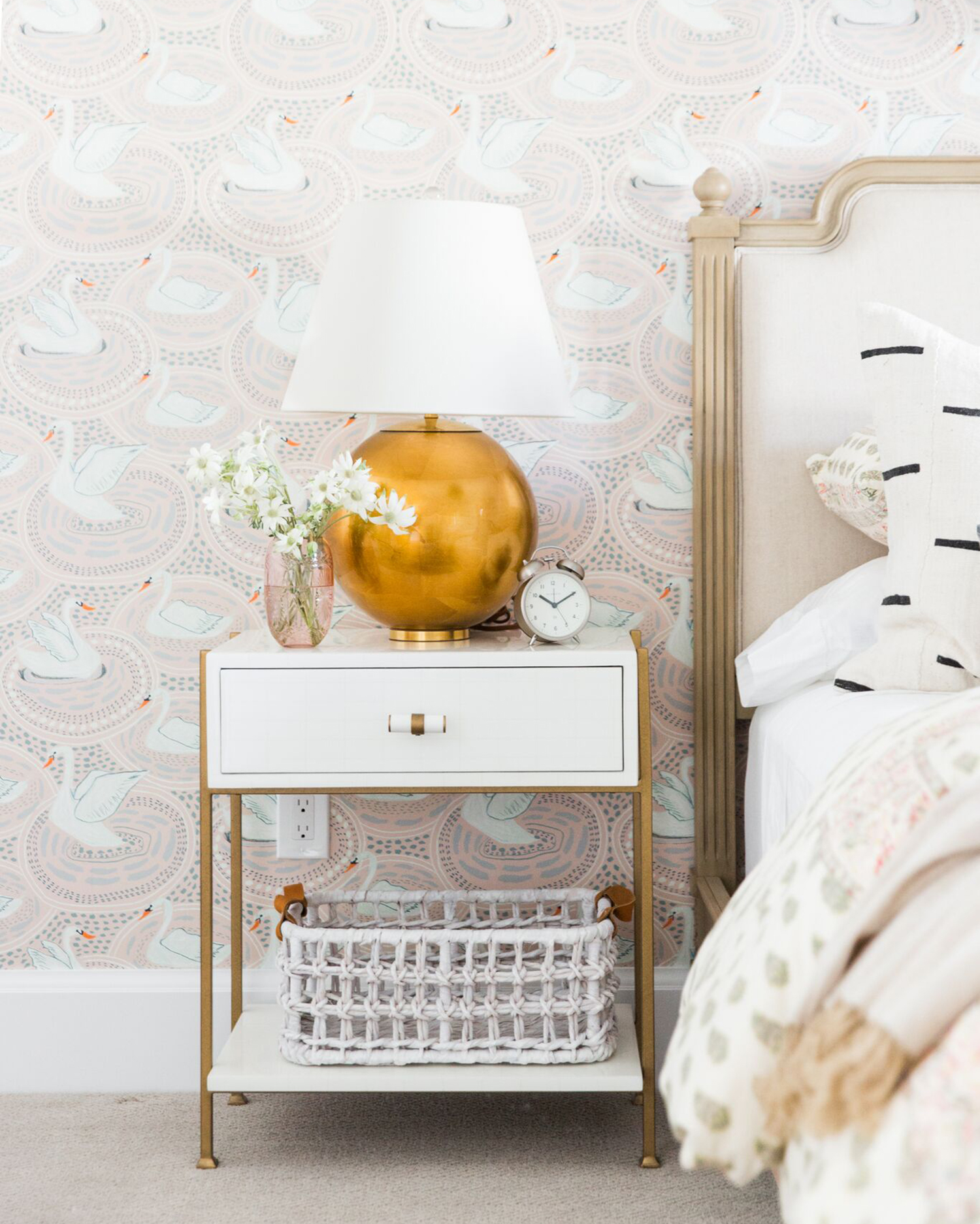 Bedroom with pink wallpaper