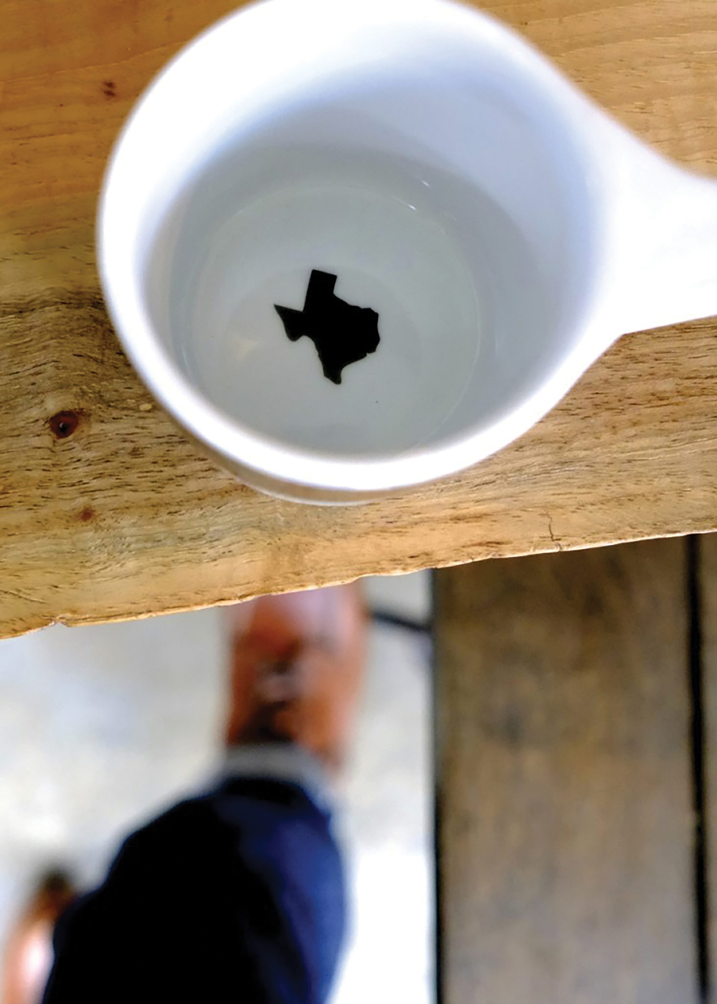Coffee mug with Texas shape inside