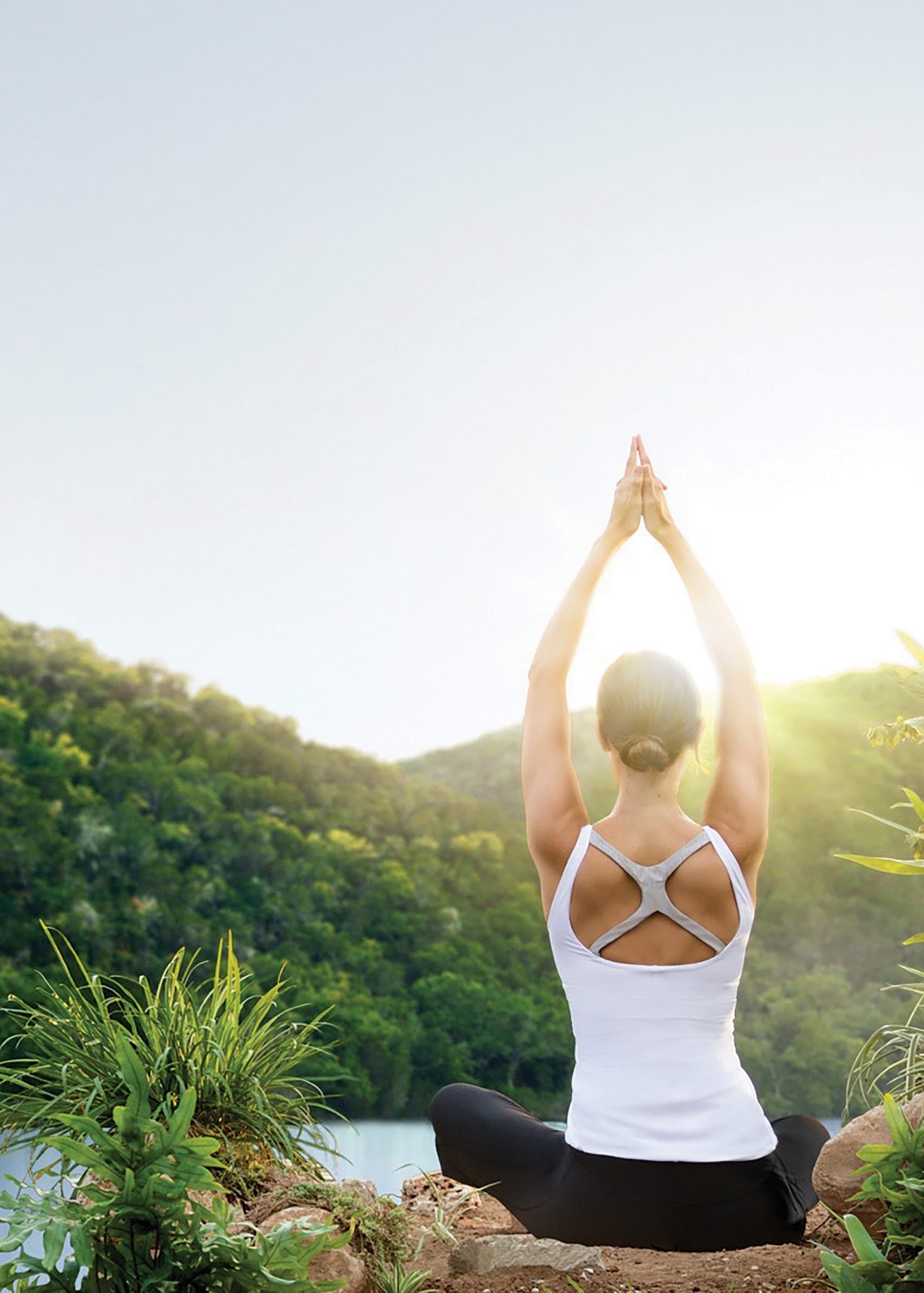 Woman outside doing yoga