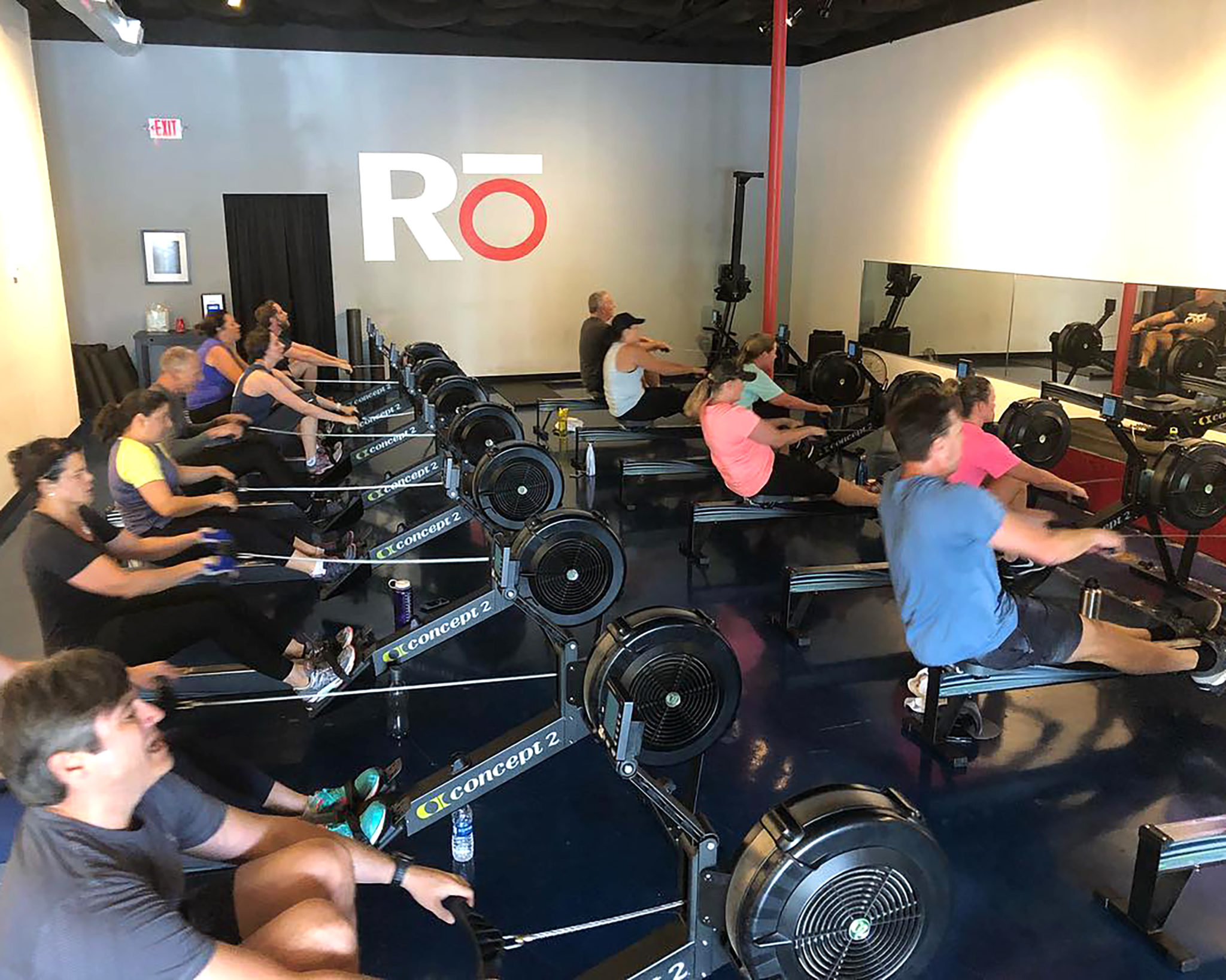 People in a rowing exercise class