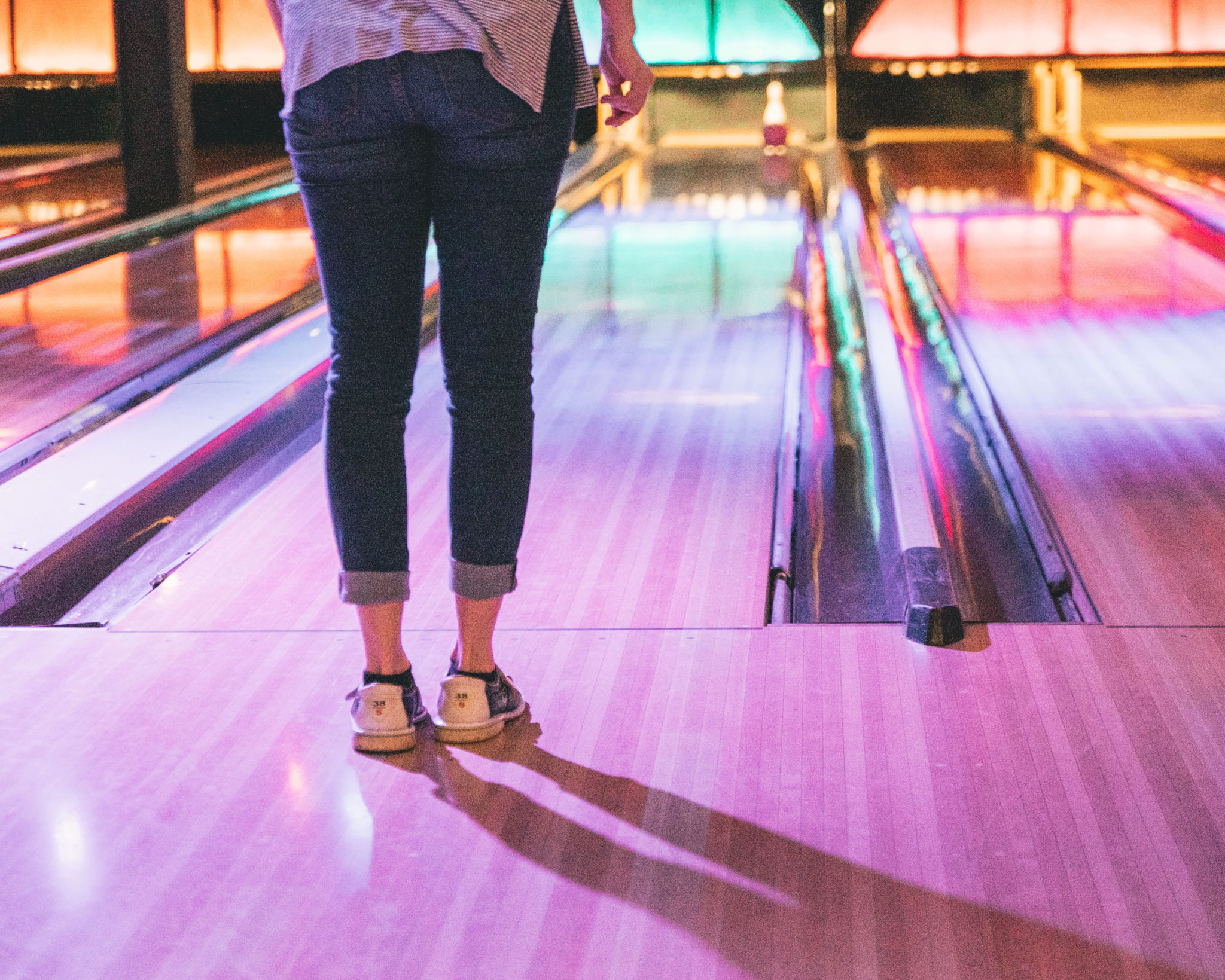 Woman at a bowling alley