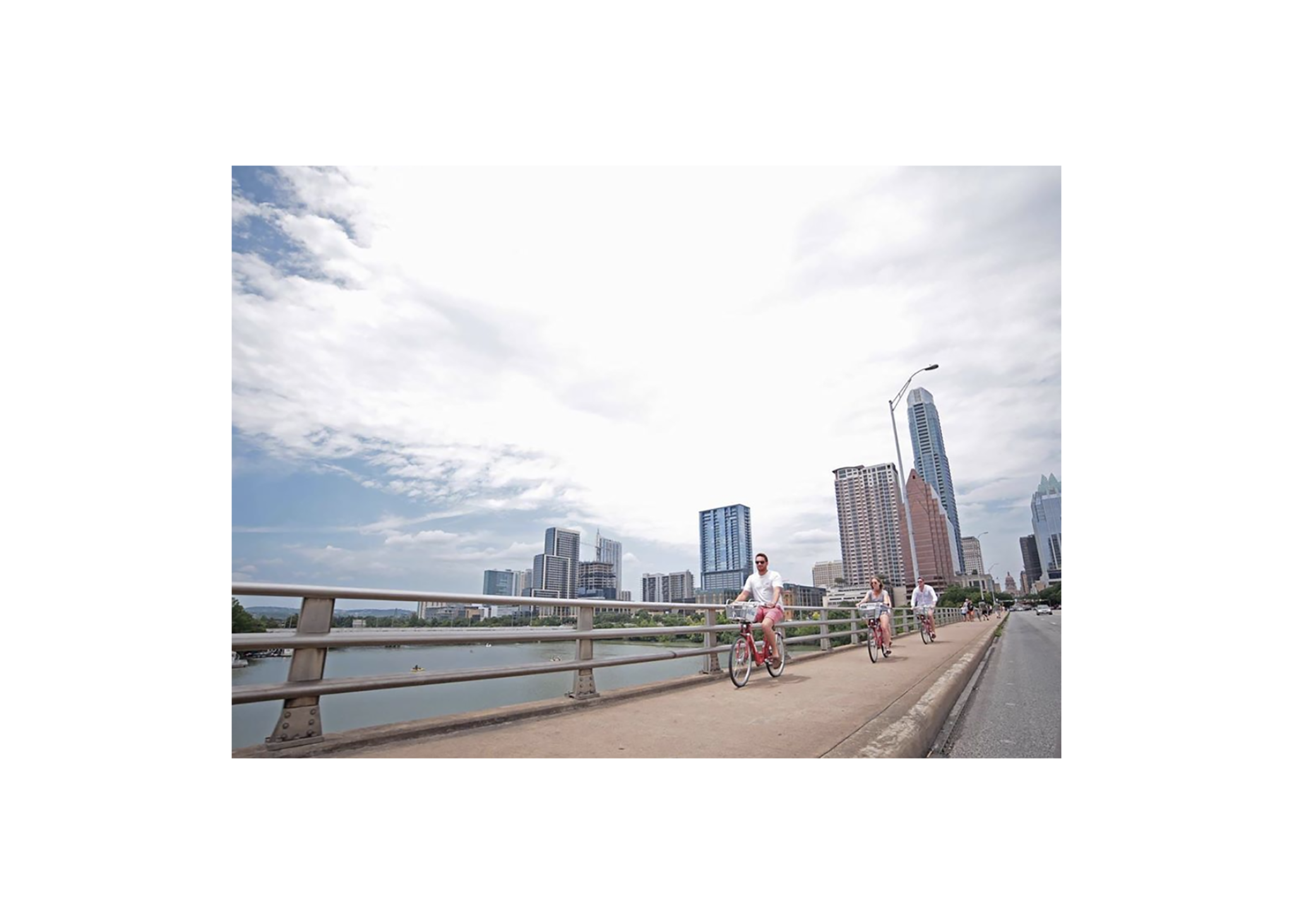 Cycling on Austin bridge