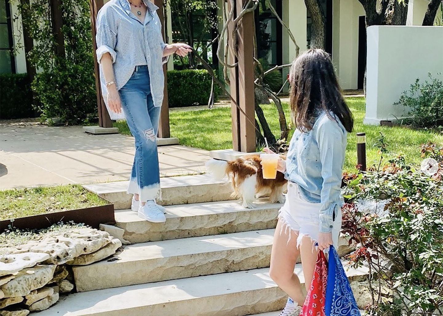 Women walking a dog