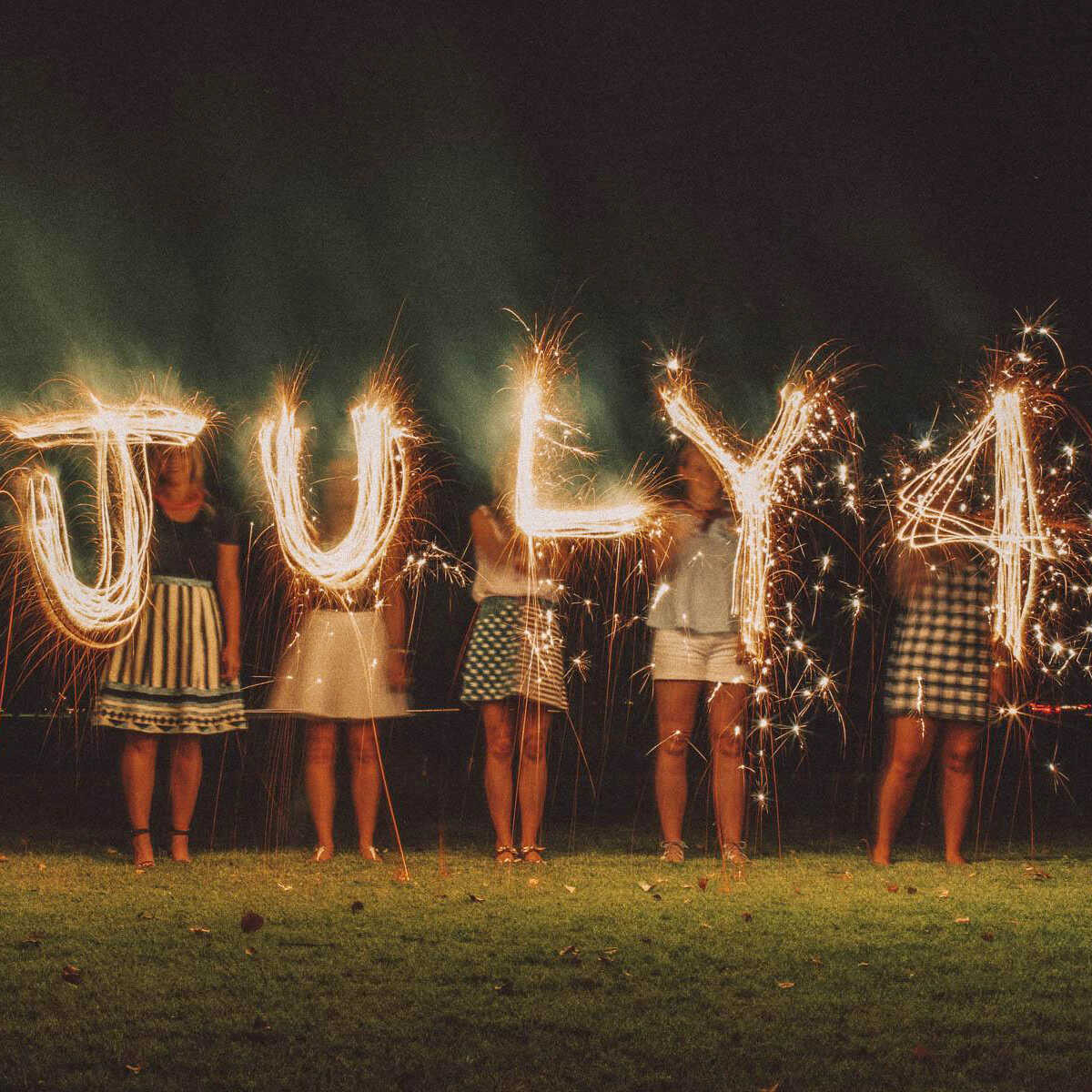 Sparklers spelling out July 4