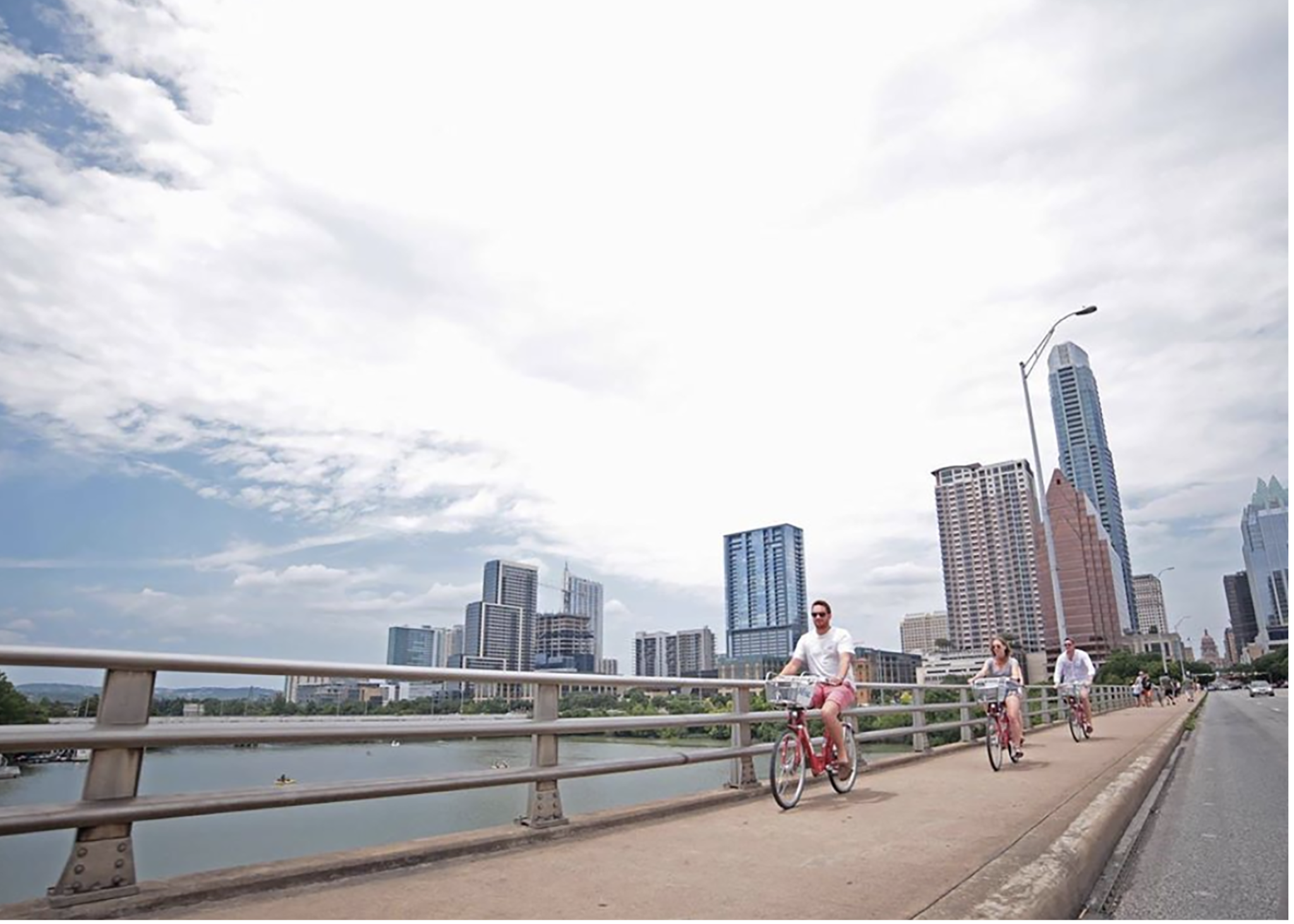 Cycling on Austin bridge