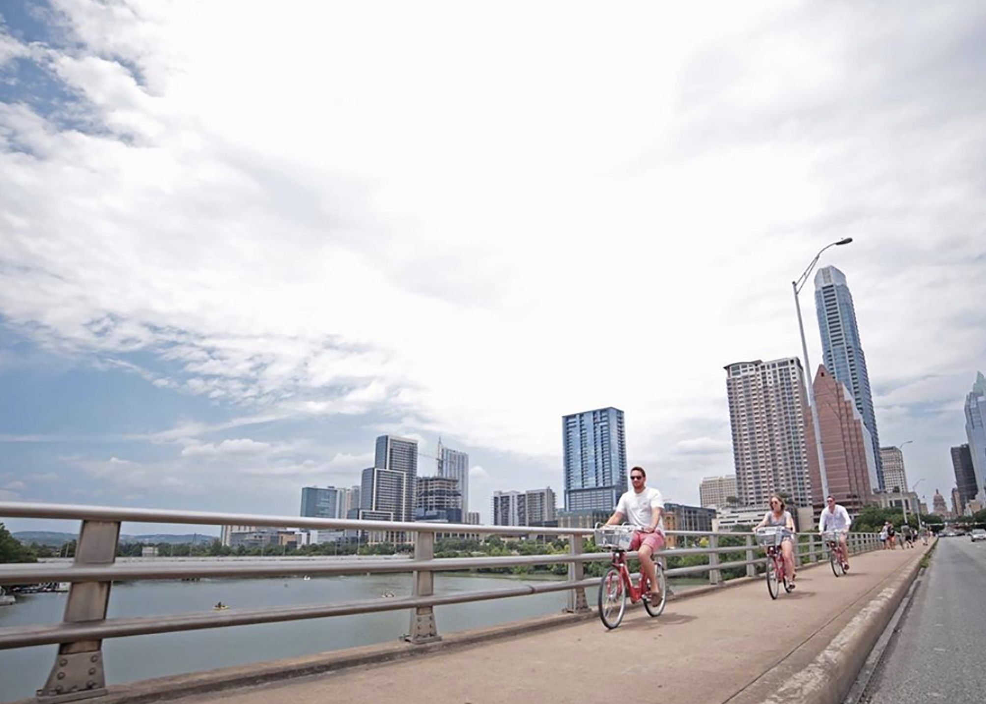 Cycling on Austin bridge